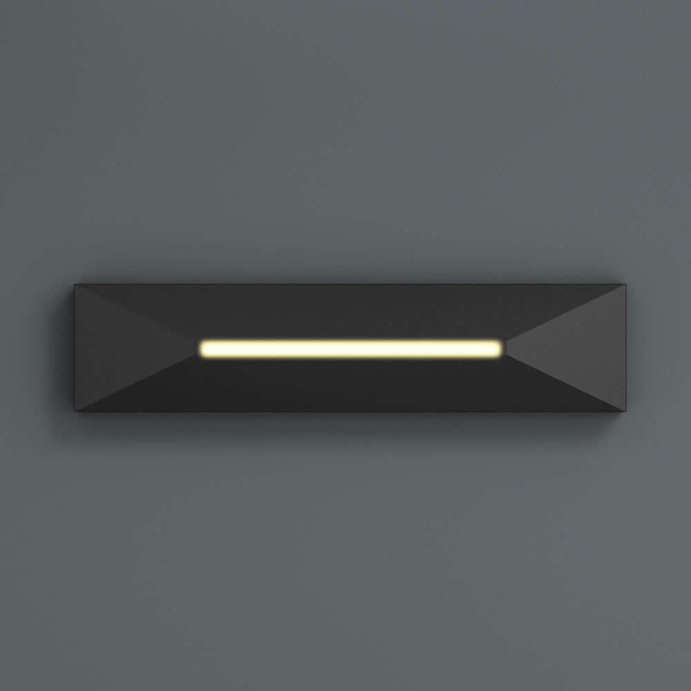 Black 4-inch step light with a sleek design and warm white glow, ideal for horizontal or vertical mounting.
