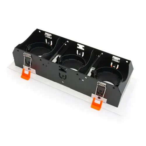 VBD-MTR-78T recessed light trim with three light sockets and orange clips for mounting.