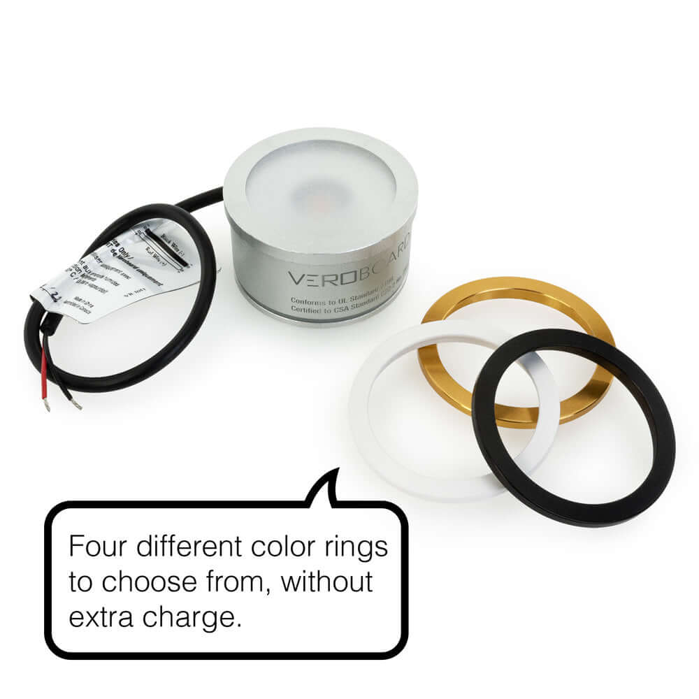 VBD-TR5-W-50K LED Light Engine with four interchangeable color trim rings: silver, white, black, and gold.